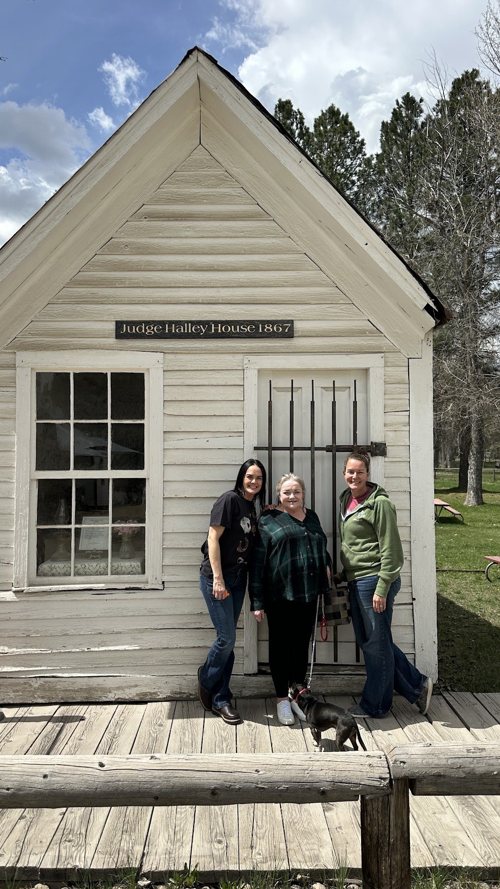 Family standing outside a historic Idaho building